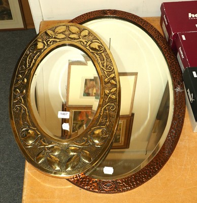 Lot 1467 - An Arts & Crafts Brass Mounted Oval Mirror,...