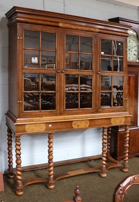 Lot 1527 - A Waring & Gillow Walnut Bookcase on Stand, in...