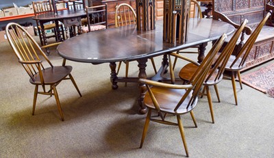 Lot 1517 - An Ercol Extending Dining Table, 212cm (open)...