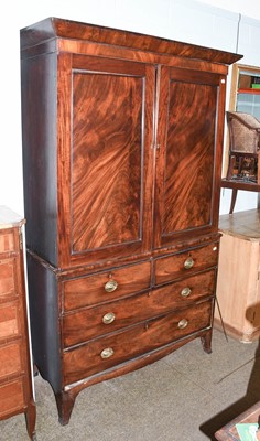 Lot 1378 - A George III Mahogany Press Cupboard, on four...