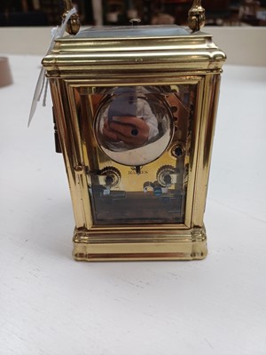 Lot 120 - A Brass Strike and Repeat Carriage Clock,...