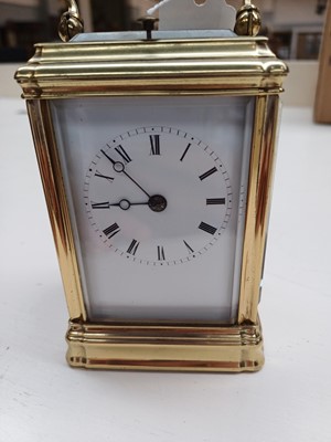 Lot 120 - A Brass Strike and Repeat Carriage Clock,...