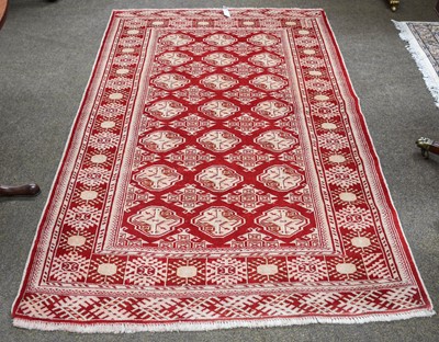 Lot 1285 - Afghan Turkmen Rug, the crimson field with...