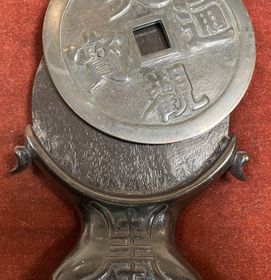 Lot 234 - A Pair Chinese Bronze Bi Discs, on carved...