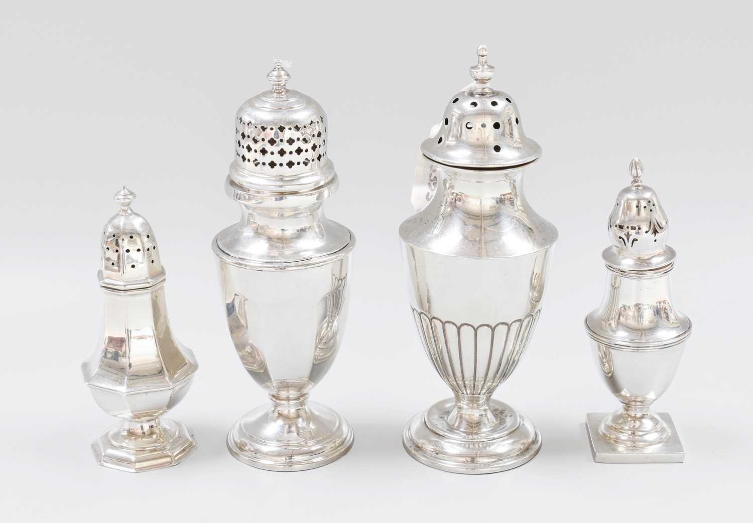 Lot 67 - Four Various Silver Casters or Pepperettes,...