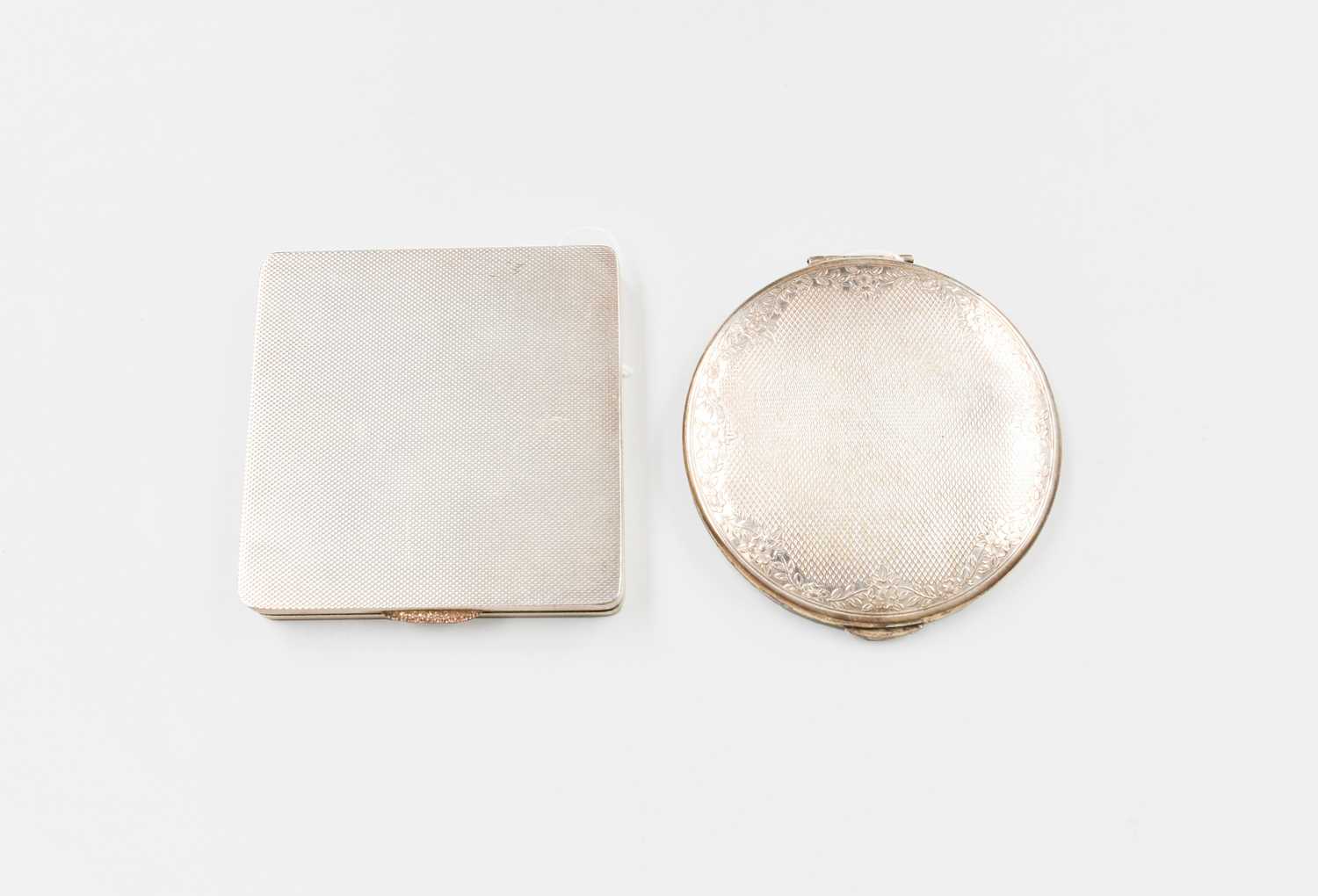Lot 74 - Two Silver Compacts, one circular and one...