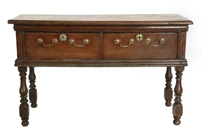 Lot 2 - A Joined Oak Dresser Base, the three-plank top...