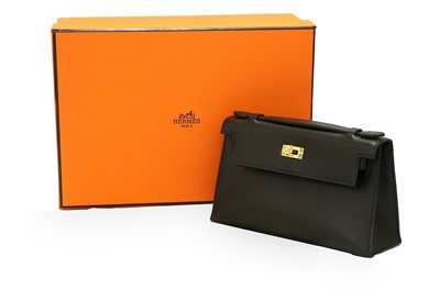 Lot Hermés Mini Kelly Black Leather Handbag, with...