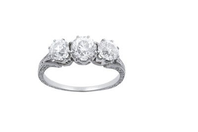 Lot 2244 - A Diamond Three Stone Ring the graduated old...