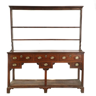 Lot 282 - A George III Oak Open Dresser and Rack, late...