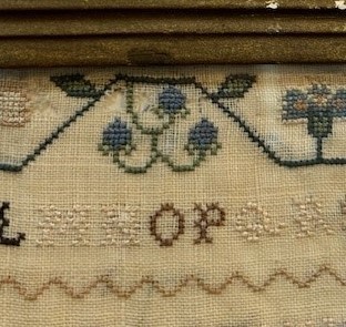 Lot 91 - A Regency Alphabet Sampler, worked by Mary...