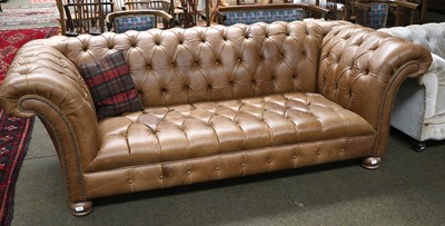 Lot 1513 - A Modern Tan Leather Chesterfield Sofa, with...