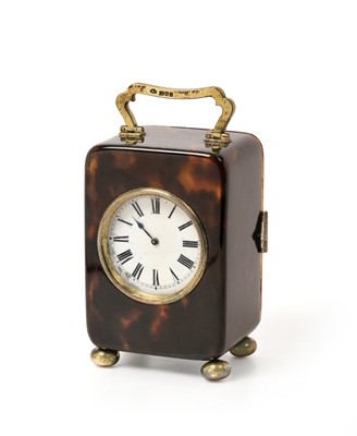 Lot 2344 - A George V Silver-Gilt Mounted Tortoiseshell Timepiece