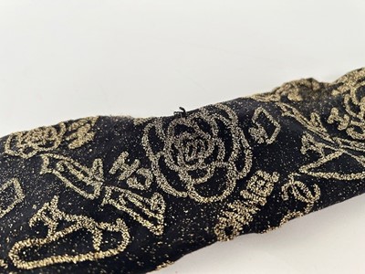 Lot 1042 - Pair of Chanel Black and Gold Tights as worn...
