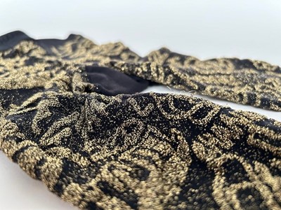 Lot 1042 - Pair of Chanel Black and Gold Tights as worn...