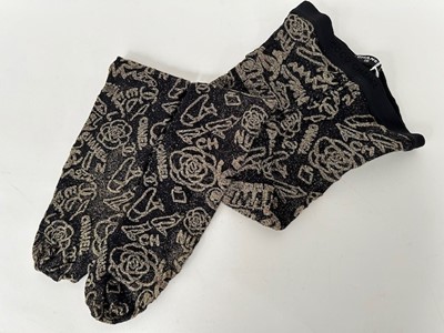 Lot 1042 - Pair of Chanel Black and Gold Tights as worn...