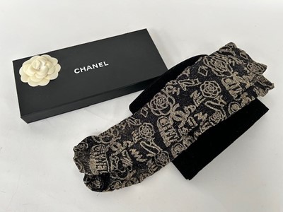 Lot 1042 - Pair of Chanel Black and Gold Tights as worn...