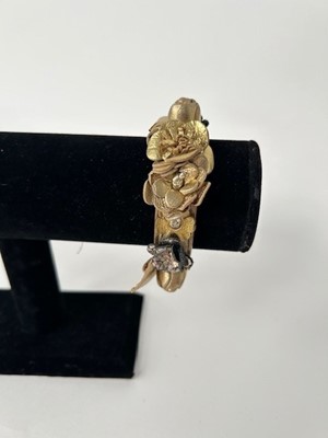 Lot 1043 - Circa 2018 Chanel Gold Leather Camelia Flower...