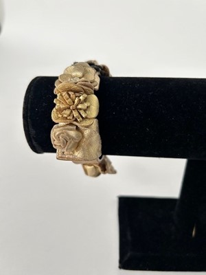 Lot 1043 - Circa 2018 Chanel Gold Leather Camelia Flower...