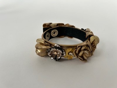 Lot 1043 - Circa 2018 Chanel Gold Leather Camelia Flower...