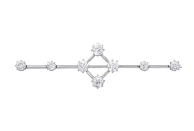 Lot 2246 - A Diamond Brooch four old cut diamonds spaced...