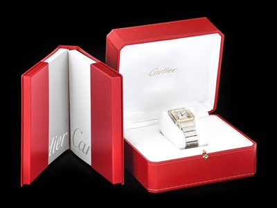 Lot 2132 - Cartier: A Steel and Gold Automatic Calendar...