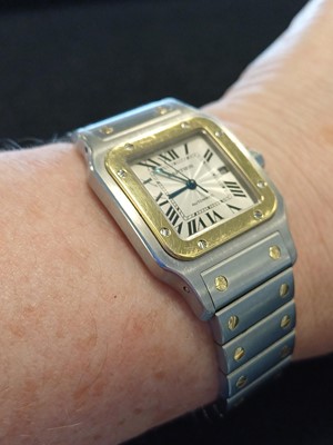 Lot 2132 - Cartier: A Steel and Gold Automatic Calendar...