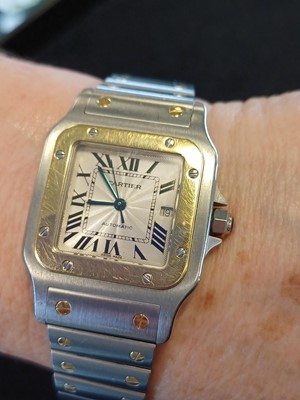 Lot 2132 - Cartier: A Steel and Gold Automatic Calendar...