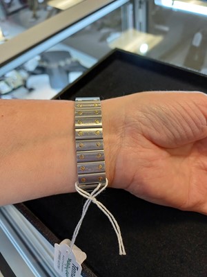 Lot 2132 - Cartier: A Steel and Gold Automatic Calendar...