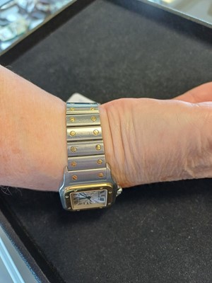 Lot 2132 - Cartier: A Steel and Gold Automatic Calendar...