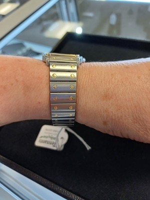 Lot 2132 - Cartier: A Steel and Gold Automatic Calendar...