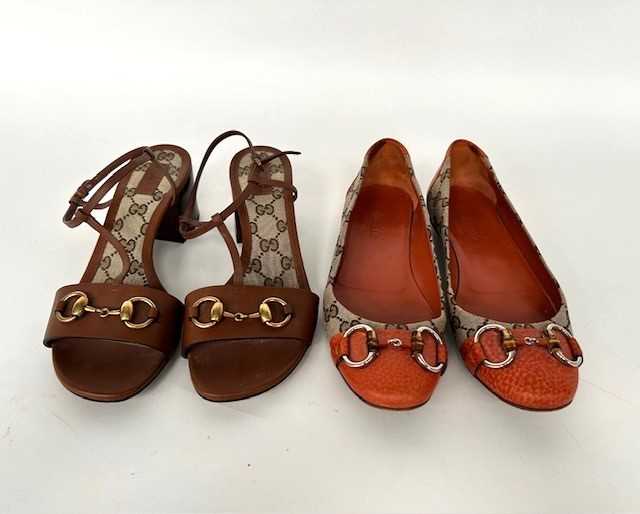 Lot 1002 - A Pair of Gucci Monogrammed Ballet Flats with...