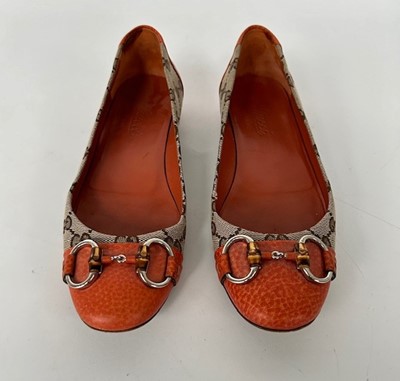 Lot 1002 - A Pair of Gucci Monogrammed Ballet Flats with...