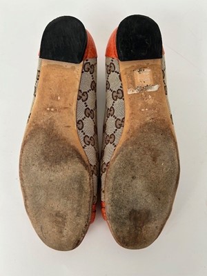 Lot 1002 - A Pair of Gucci Monogrammed Ballet Flats with...