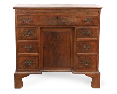 Lot 227 - A George III-Style Mahogany Kneehole Dressing...