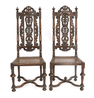 Lot 97 - A Pair of Carved Walnut Cane-Seated High-Back...