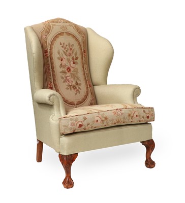 Lot 219 - A George III-Style Wing-Back Armchair, modern,...