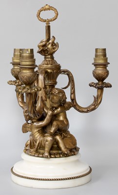 Lot 128 - A Gilt Metal Lamp of Three Cherubs, on a...