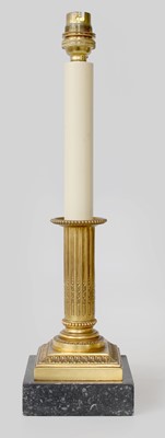 Lot 129 - A Gilt Metal Candlestick Lamp, of fluted...