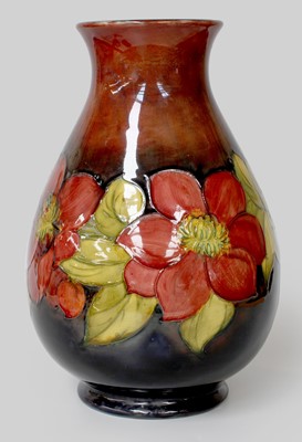 Lot 208 - A Walter Moorcroft Flambe Vase, of baluster...