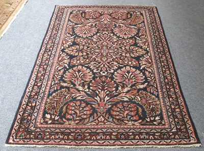 Lot 1157 - Lilihan Rug, the deep indigo field with floral...