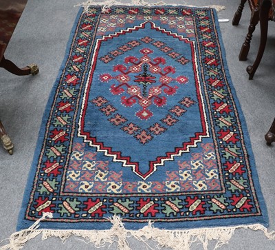 Lot 1148 - Berber Rug, the cobalt blue stepped field with...