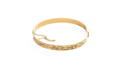 Lot 105 - A 9 Carat Gold Bangle, inner diameter 5.5cm