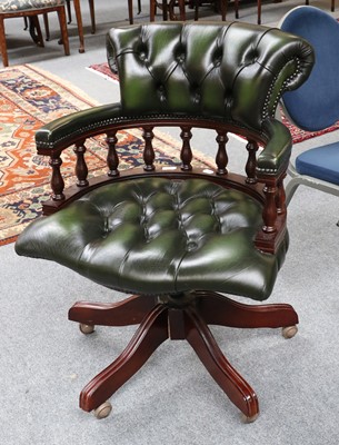 Lot 1241 - A Green Leatherette Office Swivel Chair,...