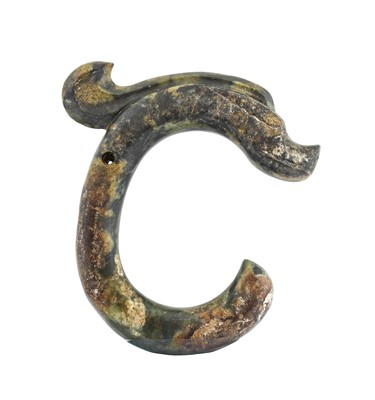 Lot 601 - A Chinese Jade Carving, in Archaic style, in...