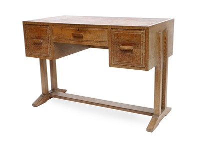 Lot 186 - A Heal's Limed Oak Kneehole Writing Desk,...