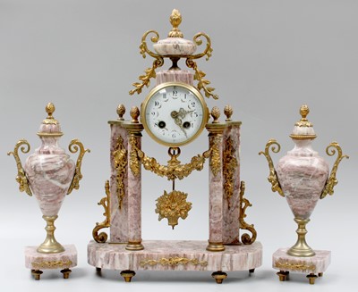 Lot 1351 - A Pink Marble Gilt Metal Mounted Striking...