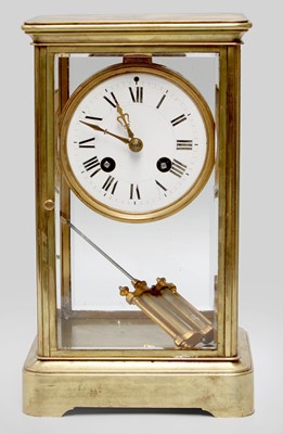 Lot 214 - A Brass Four Glass Striking Mantel Clock,...