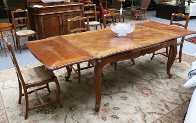 Lot 1208 - A French Fruitwood Draw Leaf Dining Table,...