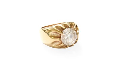 Lot 275 - A 9 Carat Gold Cubic Zirconia Solitaire Ring,...